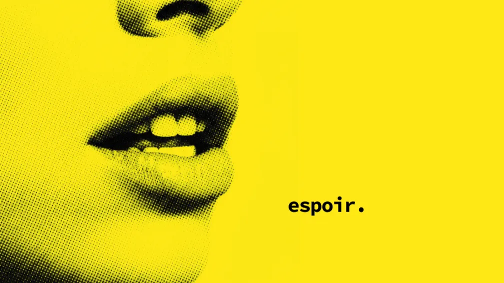 Bouche de femme en gros plan, tramée en points noirs sur fond jaune, légende « espoir. »